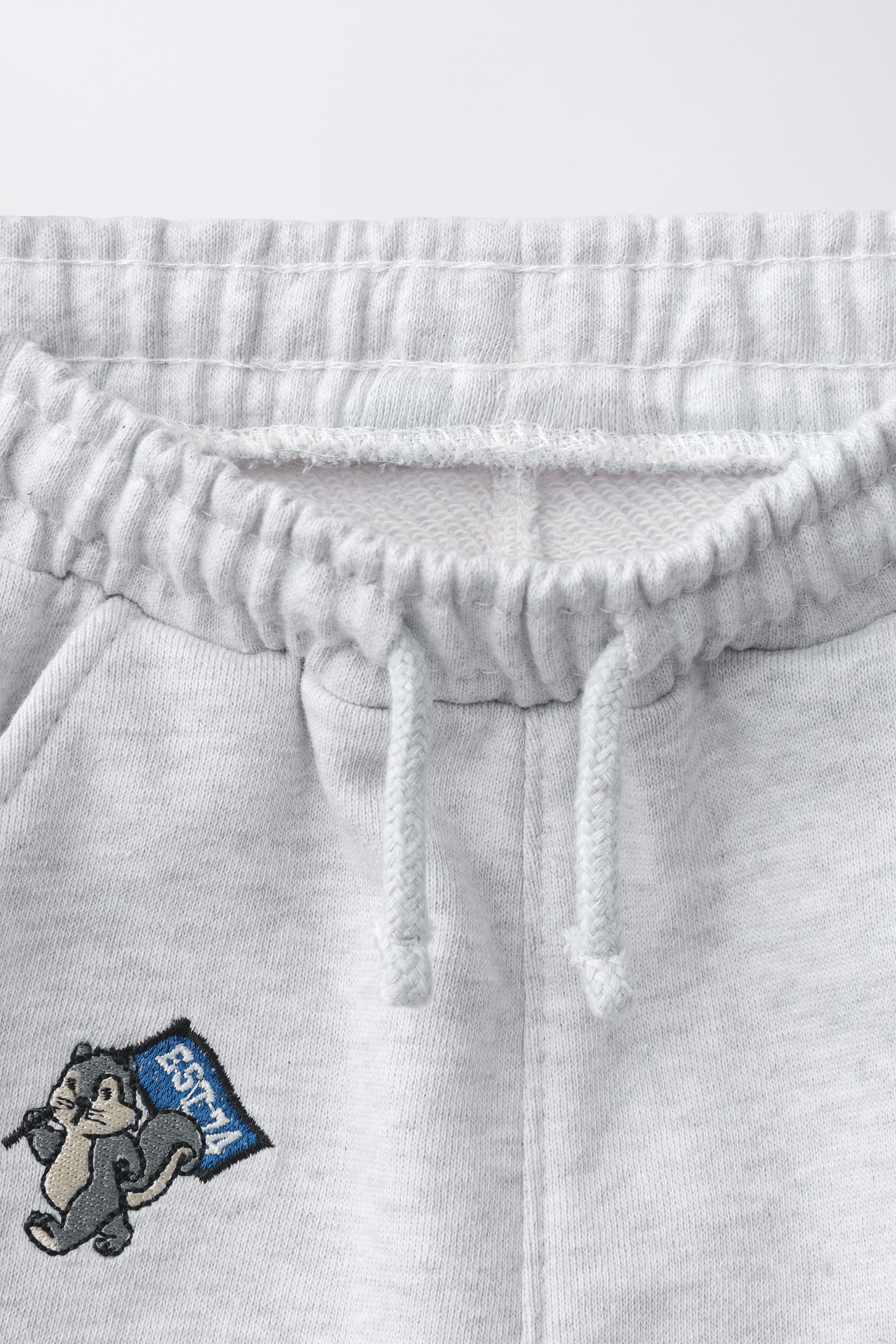 PANTALON DE JOGGING EN MOLLETON ANIMAUX BRODÉS